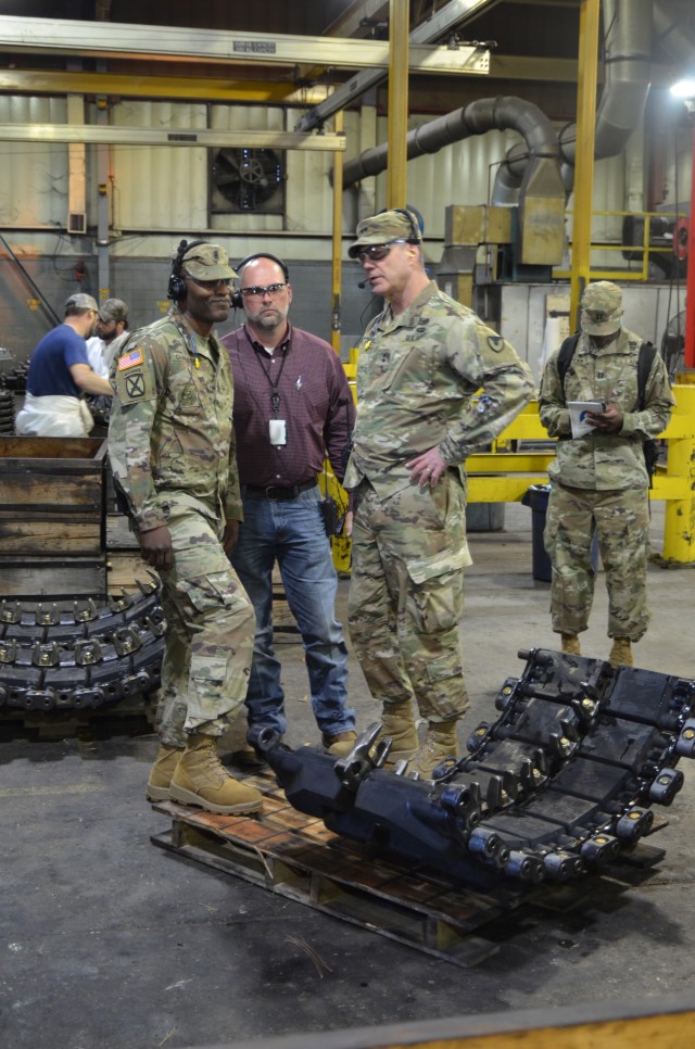 MG Mitchell tours Red River