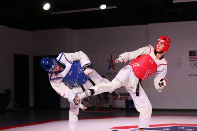 Pfc. Russell Gresham lands a kick against U.S. No.1 Jonathan Healy in the semifinals of the 2020 Poomsae Grand Slam Final in Colorado Springs. Gresham defeated Healy for the first time, 13-5. Gresham is currently ranked No. 3 in the U.S. at heavyweight. 