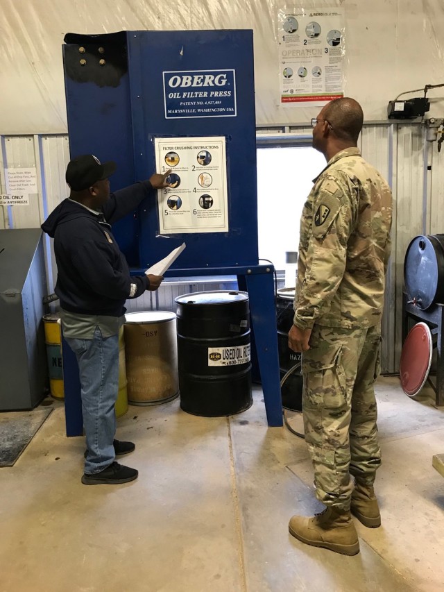 Northern Regional Coordinator, Johnny Pickett, explains the process of crushing filters utilizing the instructional poster. The Louisiana Army National Guard Environmental Office developed instructional posters for all filter crushers and aerosol puncturing devices. The posters display step-by-step procedures so that all maintenance facility personnel can be reminded of the proper procedures.