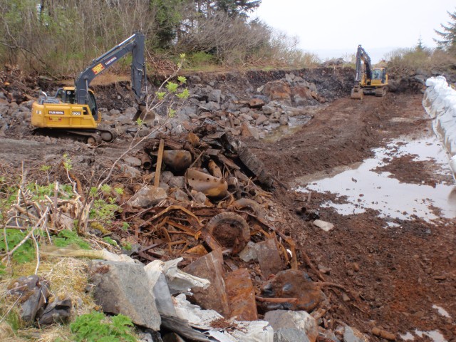 Ft. Rousseau Debris Pile developing from Virublennoi Landfill this afternoon, view SE