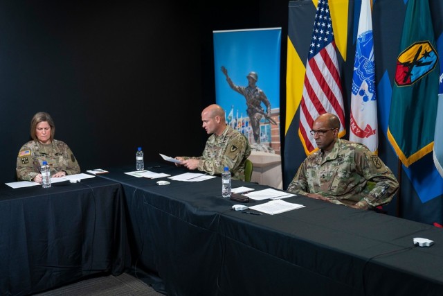 FORT BENNING, Ga. – Fort Benning leaders make final preparations moments before the start of an online community town hall meeting held March 17 to outline a range of precautionary measures being taken here against spread of the COVID-19 virus. The forum was live-streamed on Facebook and included a section that gave community members a chance to post online questions for the panel. It featured Fort Benning’s top leader, Maj. Gen. Gary M. Brito (right), commanding general of the U.S. Army Maneuver Center of Excellence and Fort Benning, Col. Matthew Scalia (center), commander, U.S. Army Garrison Fort Benning, and Col. Melissa J. Hoffman, commander of Fort Benning’s Martin Army Community Hospital. Brito called for a unified “we” mindset by which individuals base their actions on what will be best for the overall community. No cases of COVID-19 have been identified at Fort Benning but Brito said precautionary measures, including physical distancing and curtailing various activities, were necessary.