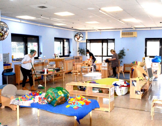 Staff members at the Miesau Army Depot Child Development Center deep clean a room while all CDCs in the USAG Rheinland-Pfalz footprint are closed for precautions against COVID-19.