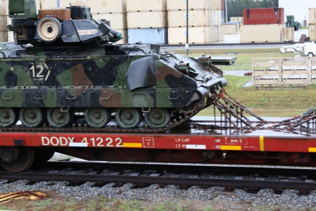 An M2 Bradley Fighting Vehicle is pictured here chained down to a rail car at the Rail Marshalling Area at Fort Stewart, Georgia, March 5. The RMA helps units load armored vehicles and tanks, such as M1 Abrams tanks, M2 Bradley Fighting Vehicles,...
