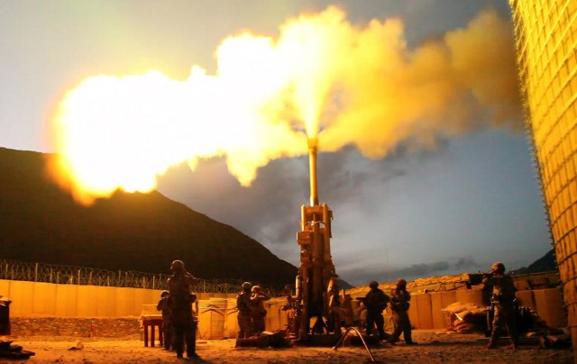 82nd Airborne Division Soldiers from Fort Bragg, North Carolina, fire 155mm rounds using an M777 Howitzer weapons system on Forward Operating Base Bostick, Afghanistan. 