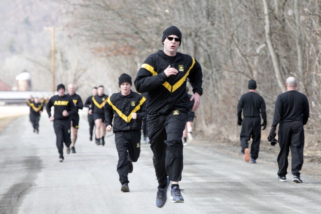Soldiers assigned to the 698th Quartermaster Company at Nichols Army Reserve Center, Nichols, New York, run the 2-mile event during their Army Physical Fitness Test. 