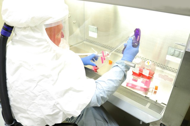 Brian Kearney, Research Microbiologist, harvests samples of coronavirus in a Biosafety Level 3 laboratory at the U.S. Army Medical Research Institute of Infectious Diseases at Fort Detrick, Md. This virus stock will be used to develop models of infection for coronavirus, as well as diagnostic tests, vaccines and therapeutics. USAMRIID, established in 1969, is the Department of Defense’s lead laboratory for medical biodefense research.