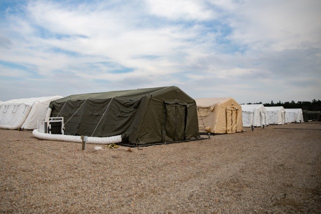 In accordance with Department of the Army guidance, Soldiers redeploying from overseas locations are required to enter a 14-day mandatory quarantine in one of several locations across the U.S., including this site on Fort Bragg, North Carolina. The 82nd Airborne Division and the Logistics Civil Augmentation Program (LOGCAP), which is overseen by the U.S. Army Sustainment Command at Rock Island Arsenal, established remote facilities to provide accommodations for up to 600 Soldiers. The facilities include recreation centers, internet services, mobile laundry units, catered food services, mobile restrooms, and showers. The Soldiers quarantined will continue regular activities after 14 days without any flu-like symptoms. (U.S. Army photo by Maj. Deirdra Johnson)