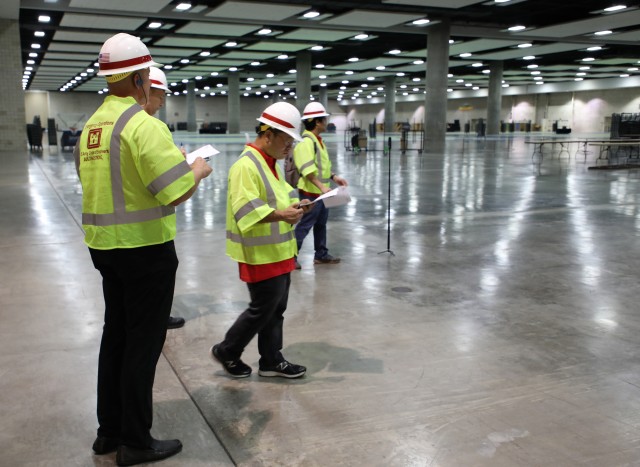 A U.S. Army Corps of Engineers technical survey team conduct a site assessment of the Honolulu Convention Center in Hawaii, March 23, 2020. USACE has identified over 110 sites across the country it could retrofit to help local hospitals deal with patient overflow amid the COVID-19 outbreak.

