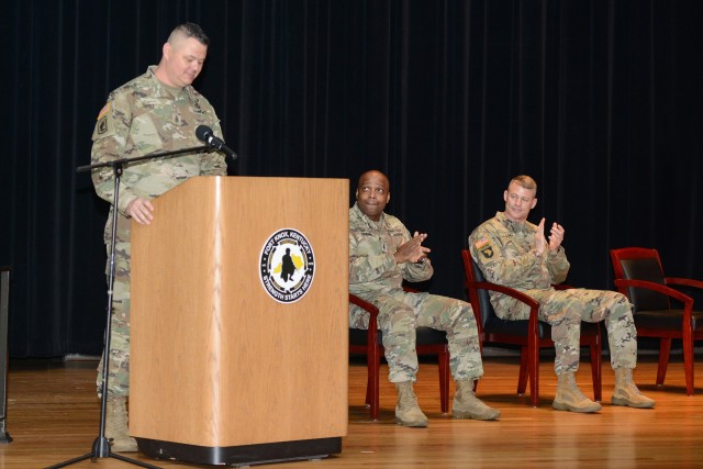 Incoming Command Sgt. Maj. William Fogle addresses attendees/viewers during a Change of Responsibility Ceremony held at Fort Knox&#39;s Waybur Theater March 27.