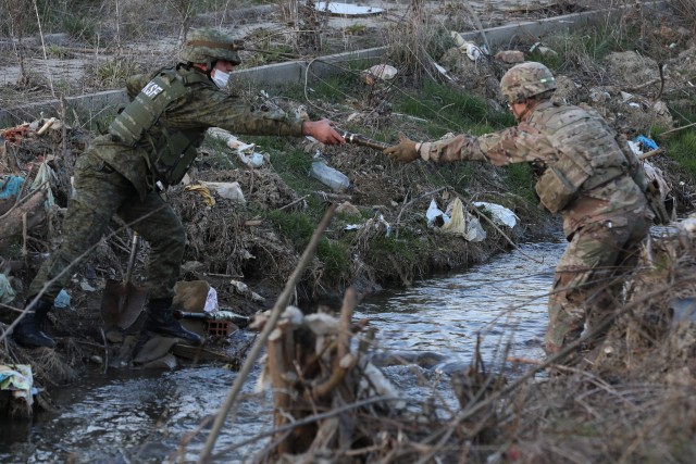 Kosovo Security Force and Kosovo Force Regional-Command East task force explosive ordnance disposal personnel secure unexploded ordnance March 21, 2020, in Pristina, Kosovo. Kosovo Police alerted KSF and TF EOD about the four UXO located in a...