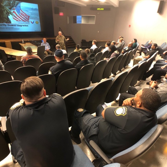 Fort Stewart Department of the Army security guards are briefed by garrison leadership about changes to the force structure during a town hall at Moon Theater, Feb. 18.