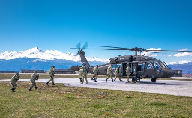 U.S. Army Soldiers from Kosovo Force Regional Command-East conduct hot, cold load training with Soldiers from the Turkish army on March 16, 2020, on Camp Bondsteel, Kosovo. Hot, cold training teaches military members the proper safety procedures...