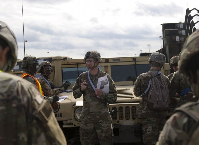 A 3rd Infantry Division Soldier performs a convoy brief prior to the movement of military vehicles on Feb. 5 in Savannah, Ga. This movement of equipment is in preparation for the DEFENDER-Europe 20 exercise which takes place in multiple European countries. DEFENDER-Europe 20 will build strategic-level readiness and demonstrate the U.S. military’s ability to rapidly deploy a large combat-credible force in support of the U.S. National Defense Strategy. (U.S. Army photo by Pfc. Carlos Cuebas Fantauzzi, 22nd Mobile Public Affairs Detachment)