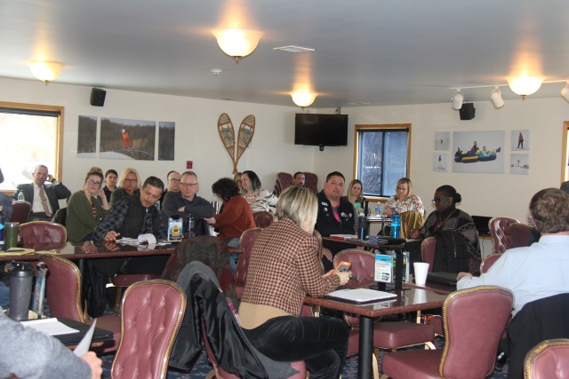 Members of the Wisconsin Inter-Service Family Assistance Committee (ISFAC) speak at the March 5 meeting held at Fort McCoy's Whitetail Ridge Ski Area Chalet. The Wisconsin ISFAC is a military/community cooperative partnership that allows service...