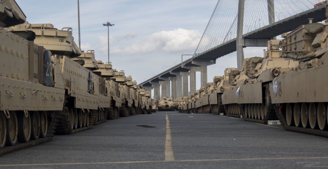 M1 Abrams Tanks stand ready prior to being loaded onto the American Roll-On Roll-Off Carrier Endurance on February 6, 2020 in Savannah, Ga. The tanks are being loaded and sent overseas for DEFENDER-Europe 20. Exercise DEFENDER-Europe 20 is the deployment of a division-size combat-credible force from the United States to Europe, the drawing of Army Prepositioned Stock, and the movement of personnel and equipment across the theater to various training areas. (U.S. Army photo by Pfc. Carlos Cuebas Fantauzzi/ 22nd Mobile Public Affairs Detachment)