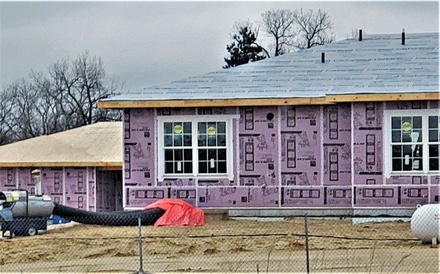 Workers with contractor Relyant Global LLC of Maryville, Tenn., continue work on a U.S. Army Corps of Engineers-led project March 26, 2020, to build seven new military family housing units at the South Post Housing area at Fort McCoy, Wis. A...