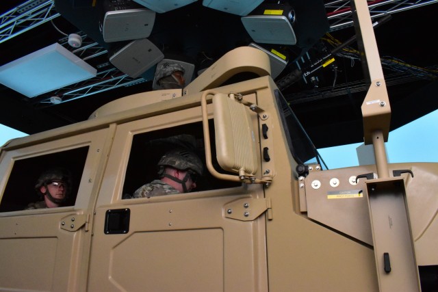 Soldiers with Headquarters Support Company, Headquarters and Headquarters Battalion, 3rd Infantry Division, test their warrior skills in the close combat tactical trainer reconfigurable vehicle system convoy escort exercise, Feb. 7, at Fort Stewart, Ga.  The CCTT RVS challenged the Soldiers on their fundamentals and roles for escorting a convoy. (U.S. Army Photo by Spc. William Griffen, 50th Public Affairs Detachment)