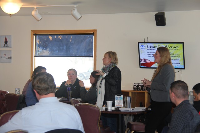 Members of the Wisconsin Inter-Service Family Assistance Committee (ISFAC) speak at the March 5 meeting held at Fort McCoy's Whitetail Ridge Ski Area Chalet. The Wisconsin ISFAC is a military/community cooperative partnership that allows service...