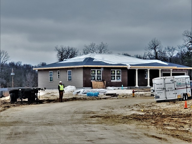 Workers with contractor Relyant Global LLC of Maryville, Tenn., continue work on a U.S. Army Corps of Engineers-led project March 26, 2020, to build seven new military family housing units at the South Post Housing area at Fort McCoy, Wis. A...