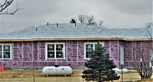 Workers with contractor Relyant Global LLC of Maryville, Tenn., continue work on a U.S. Army Corps of Engineers-led project March 26, 2020, to build seven new military family housing units at the South Post Housing area at Fort McCoy, Wis. A...