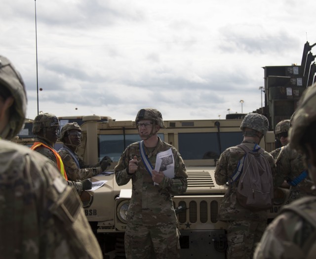 A 703rd Brigade Support Battalion, 2nd Armored Brigade Combat Team, 3rd Infantry Division Soldier gives a brief prior to Soldiers heading out in a convoy on Feb. 6, 2020 in Fort Stewart, Ga. The purpose of the convoy is to transport military vehicles to the pier in preparation for DEFENDER Europe-20. Exercise DEFENDER-Europe 20 is the deployment of a division-size combat-credible force from the United States to Europe, the drawing of Army Prepositioned Stock, and the movement of personnel and equipment across the theater to various training areas. (U.S. Army photo by Pfc. Carlos Cuebas Fantauzzi, 22nd Mobile Public Affairs Detachment)