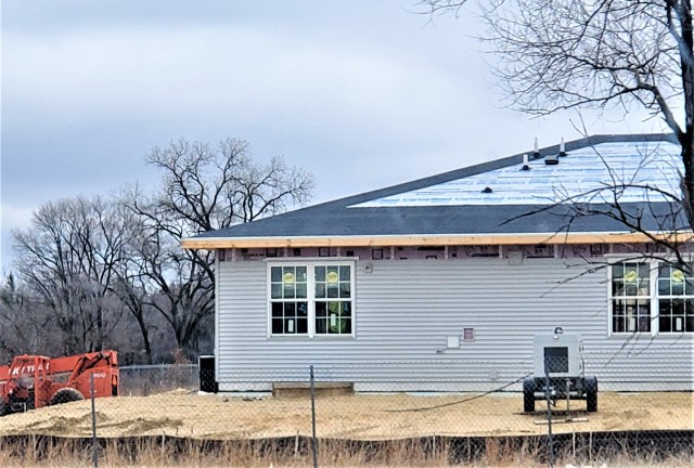 Workers with contractor Relyant Global LLC of Maryville, Tenn., continue work on a U.S. Army Corps of Engineers-led project March 26, 2020, to build seven new military family housing units at the South Post Housing area at Fort McCoy, Wis. A...