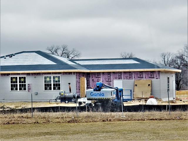 Workers with contractor Relyant Global LLC of Maryville, Tenn., continue work on a U.S. Army Corps of Engineers-led project March 26, 2020, to build seven new military family housing units at the South Post Housing area at Fort McCoy, Wis. A...