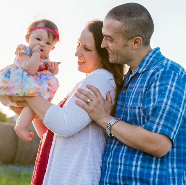 Air Force Master Sgt. William “Mac” McMillan enjoys time with his wife Christy and daughter Aria. Courtesy photo
