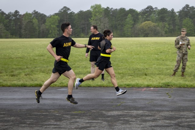 U.S. Army 1st Lt. Hannah Whitney, a platoon leader assigned to Alpha Troop, 3rd Squadron, 89th Cavalry Regiment, 3rd Brigade Combat Team, 10th Mountain Division runs during the Army physical fitness test event for the expert soldier badge at Honor Field, Fort Polk, Louisiana, March 23, 2020. Candidates must score an 80 percent or higher in each APFT event in order to advance to the next stage of ESB testing. (U.S. Army photo by Staff Sgt. Ashley M. Morris)