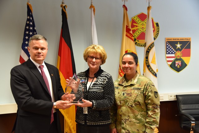 Ingrid Osewalt, U.S. Army Garrison Rheinland-Pfalz Family and Morale, Welfare and Recreation (MWR) program analyst and acting deputy director, receives the 2019 Norman H. Marcus Award from Installation Management Command-Europe Director Tommy Mize...