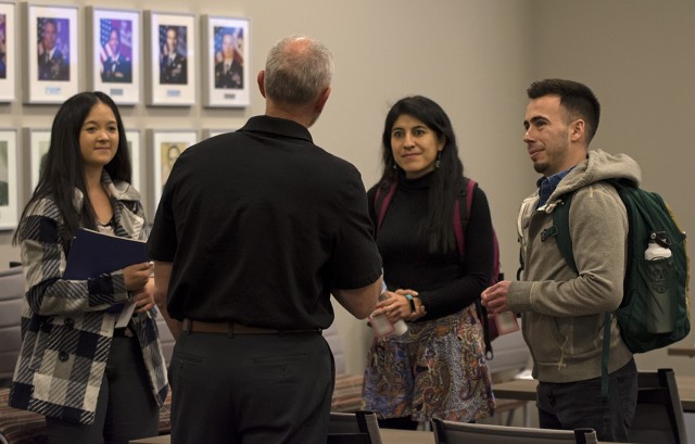 University of New Mexico students speak with Reginald Bourgeois, USACE-Albuquerque District STEM outreach coordinator, during a STEM outreach event hosted by the U.S. Army Corps of Engineers-Albuquerque District at the USACE-Albuquerque District...
