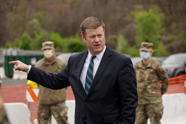 Secretary of the Army Ryan D. McCarthy visits the state of Maryland&#39;s first COVID-19 screening site next to FedEx Field in Landover, Md., March 31, 2020.  Part of Maryland National Guard’s response, the site is one of several that continue to stand up across the country as Soldiers swap in their weapons for masks and gloves. 