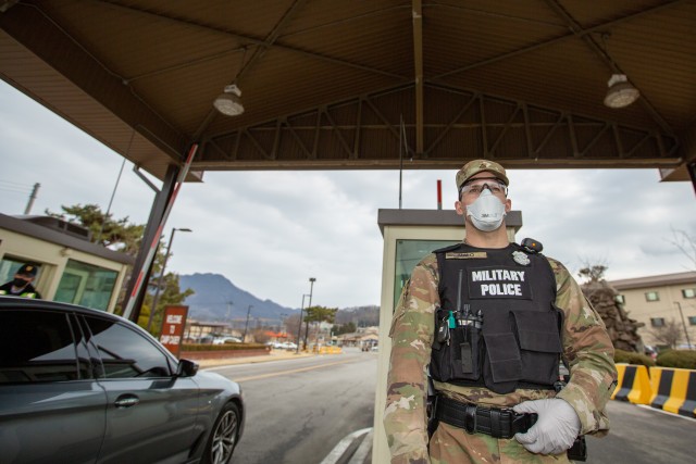 Soldiers stationed on U.S. Army Garrison Casey conduct pre-screening processes on individuals awaiting entry to the base, USAG-Casey, Dongducheon, Republic of Korea, Feb. 26, 2020. Additional screening measures of a verbal questionnaire and...