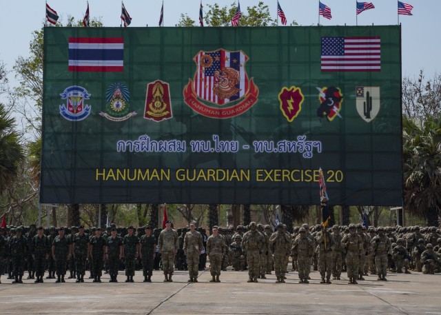 Soldiers from 2nd Battalion, 35th Infantry Regiment, 25th Inf. Division, stand shoulder to shoulder with their counterparts from the 23rd Infantry Reg., 4th Bat., Royal Thai Army, Feb. 24, 2020 during the opening ceremony of Exercise Hanuman Guardian 20 at Camp Friendship in Korat, Thailand. Hanuman Guardian is an annual exercise, now in its tenth iteration, that is designed to enhance U.S. Army and Royal Thai Army capabilities, build strong relationships between both armies and increase mission readiness, enabling regional security and stability in the region.  (U.S. Army Photo by Sgt. 1st Class John Etheridge)