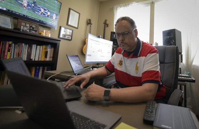 Charles Brandon, the Army director for continuous process improvement, works in his home office March 31, 2020.