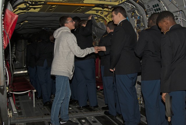 Chatham County, Ga., Junior Reserve Officers’ Training Course cadets receive a tour of a Boeing CH-47F Chinook helicopter during the Hunter Army Airfield, Ga. JROTC Day aircraft hangar tour, March 04, 2020, at HAAF. JROTC Day consists of a...