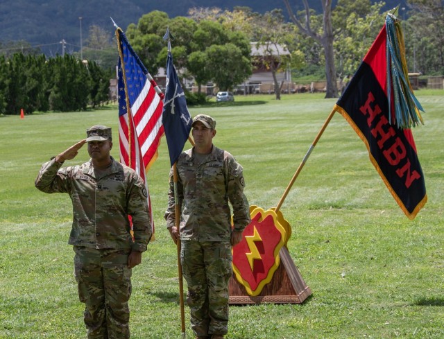 SCHOFIELD BARRACKS, Hawaii – Capt. Jonathan W. Davis, an infantryman assigned to 25th Infantry Division, salutes assuming command of Lightning Academy during his Change of Command ceremony on Leader’s Field, April 2, 2020. Davis, a native of...