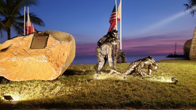 BAGAC, BATAAN, Philippines--A statue honoring those who fought in the Battle of Bataan and subsequent death march. Members of the Greywolf brigade were in the Philippines to represent the 1st Cavalry Division--the first American Division into...