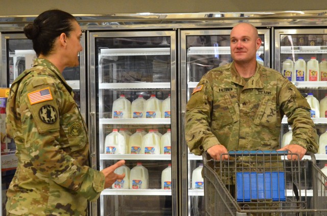 Command Sgt. Maj. Rebecca Myers, Fort Stewart Garrison’s senior enlisted leader, speaks with Sgt. Pekka Valtonen, a tanker assigned to 2nd Battalion, 7th Infantry Regiment, 1st Armored Brigade Combat Team, 3rd Infantry Division, at the Commissary on Fort Stewart, Georgia., April 3, 2020. Myers visits several places on the installation every day to ensure operations are running smooth and to get an update on how people in the Marne community are doing. (U.S. Army photo by Sgt. Zoe Garbarino)