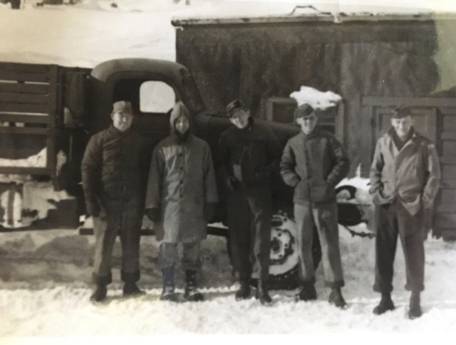 Army Cpl. William Lapschies, right, and four other soldiers in the Aleutian Islands during World War II.