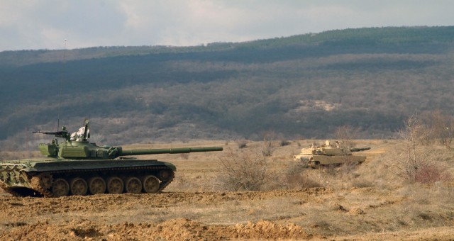 Bulgarian tankers in their T-72 tank prepare for Combine Arms Live Fire Exercise (CALFEX) with C Company, 1st Battalion, 5th Cavalry Regiment, 2nd Armored Brigade Combat Team, 1st Cavalry Division, at the Novo Selo Training Area in Mokren,...