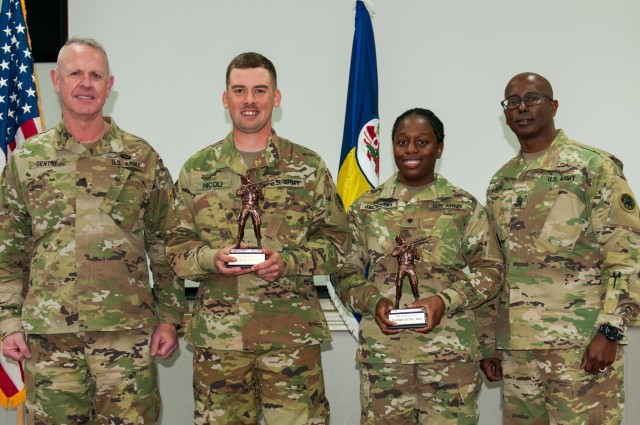 Georgia Army National Guardsmen, Brig. Gen. John T. Gentry, commander of the Marietta-based, 78th Troop Command and Command Sgt. Maj. Paul Locke, brigade senior enlisted advisor, award the 78th Troop Command's Noncommissioned Officer and Soldier...