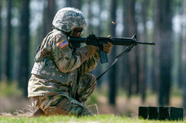 Georgia Army National Guardsman Spc. Samantha Jackson, a logistics specialist with the Tifton-based 110th Combat Service Support Battalion, engages targets during the individual weapon qualification event at the 2020 78th Troop Command Best...