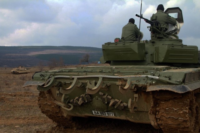 Bulgarian tankers in their T-72 tank prepare for Combine Arms Live Fire Exercise (CALFEX) with C Company, 1st Battalion, 5th Cavalry Regiment, 2nd Armored Brigade Combat Team, 1st Cavalry Division, at the Novo Selo Training Area in Mokren,...