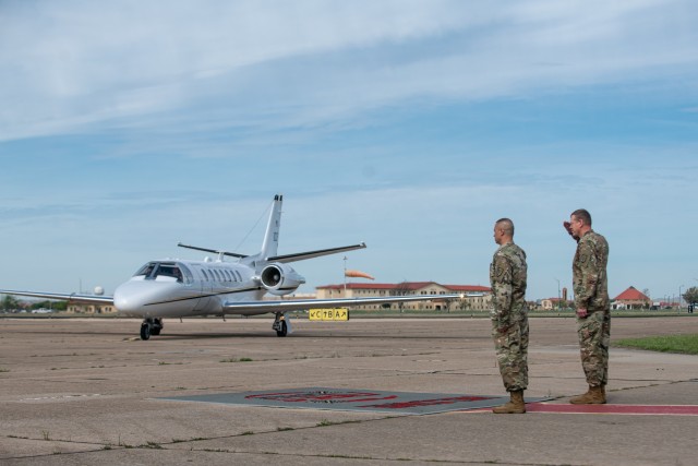 Fort Sill’s Commanding General Ken L. Kamper and Command Sgt. Maj. John W. Foley, wait at the Henry Post Army Airfield at Fort Sill, OK, for the arrival of Gen. Paul E. Funk II, the commander of the U.S. Army Training and Doctrine Command on...