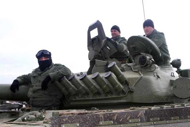 Bulgarian tankers in their T-72 tank prepare for Combine Arms Live Fire Exercise (CALFEX) with C Company, 1st Battalion, 5th Cavalry Regiment, 2nd Armored Brigade Combat Team, 1st Cavalry Division,at the Novo Selo Training Area in Mokren, Bulgaria...