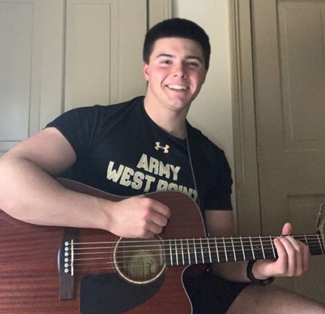 Class of 2023 Cadet Jonathan Routhier was the first cadet to take part in the show and tell when he started class by playing classical guitar. (Photo courtesy of Lt. Col. Charles Sulewski)
