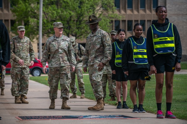 Gen. Paul E. Funk II, center left, the commander of The U.S. Army Training and Doctrine Command, meets with cadre and trainees at Fort Sill, OK, on April 7, 2020. Funk visited Fort Sill to meet with leadership throughout Fort Sill and assess the...