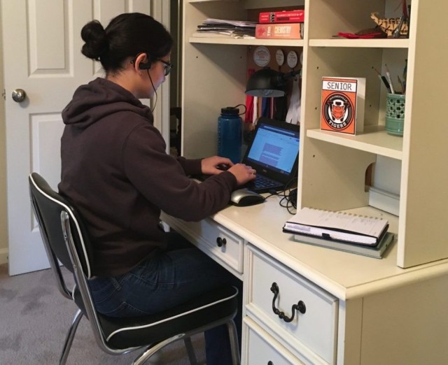 Anna studies at her home on Fort Leonard Wood.