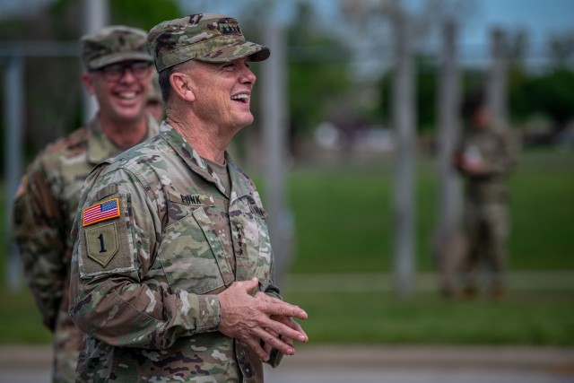 Gen. Paul E. Funk II, the commander of The U.S. Army Training and Doctrine Command, shares a laugh while conversing with the cadre of 428th Field Artillery Brigade at Fort Sill, OK, on April 7, 2020. Funk visited Fort Sill to meet with leadership throughout Fort Sill and assess the measures in place to prevent the spread of COVID-19. (U.S. Army photo by Sgt. Dustin D. Biven / 75th Field Artillery Brigade)